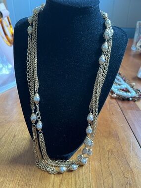 Gold and white necklace